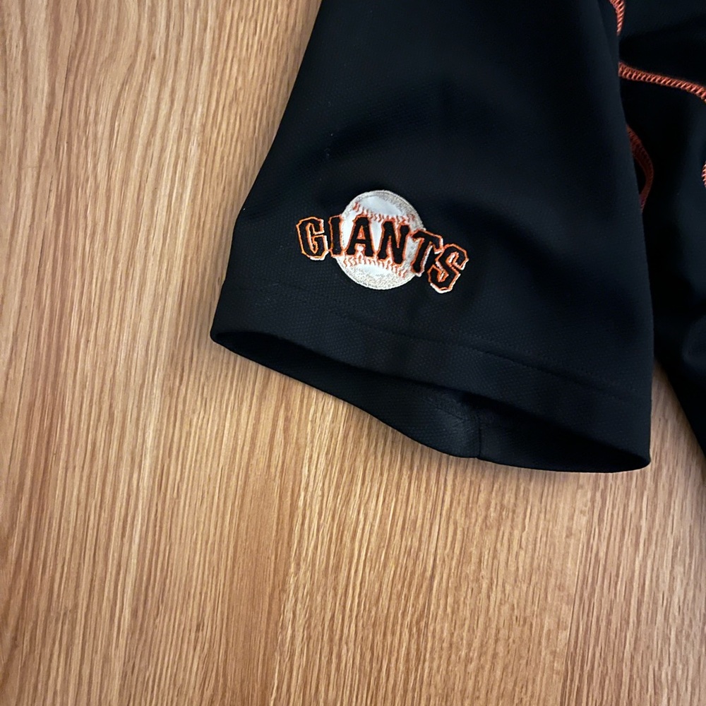 San Francisco Giants black  and orange jersey. As new condition.